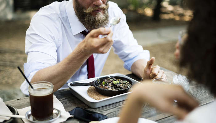 couple on a lunch date, which is among the things to do on honeymoon