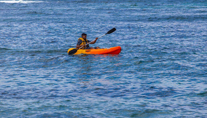 man doing kayaking