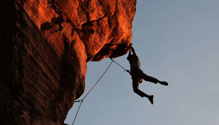 Man Climbing Rock