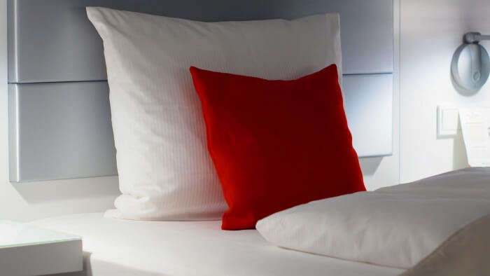 cushions on bed