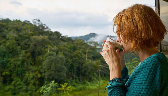 A woman sipping coffee