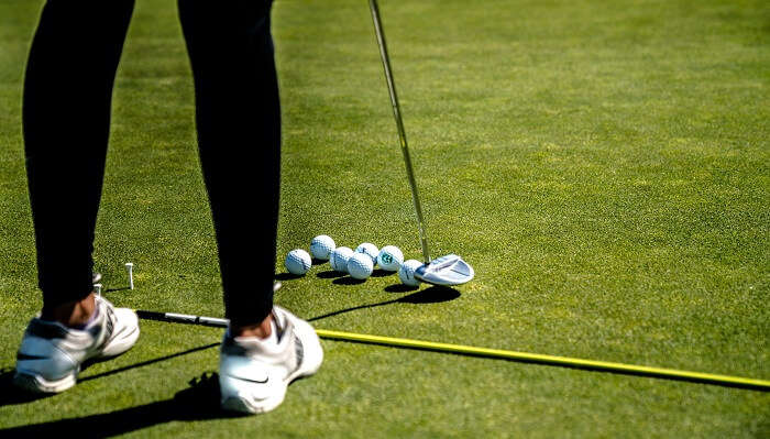 Girl Play Golf At Gleneagle