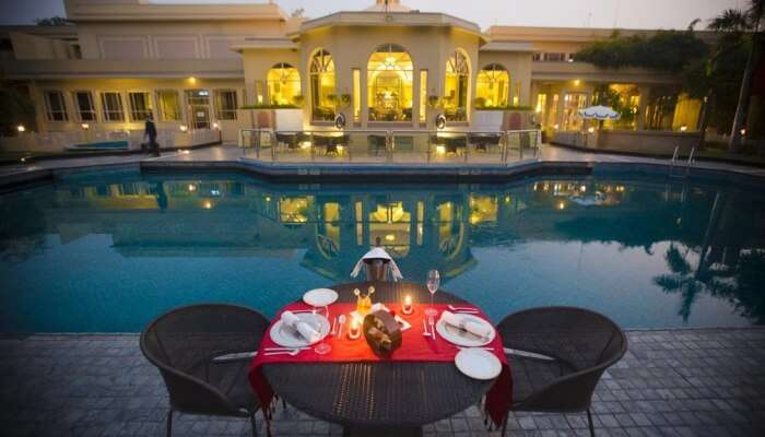 dining arrangement by the pool