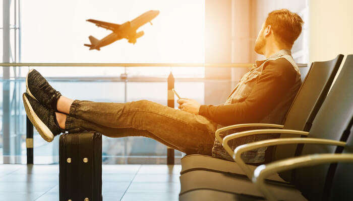 A guy waiting at the airport