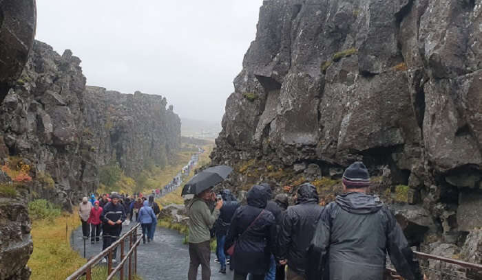 Between Eurasian and North American tectonic plates at Thingvellir National Park