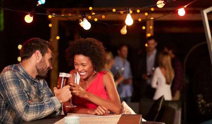 Have Drinks On A Rooftop Bar