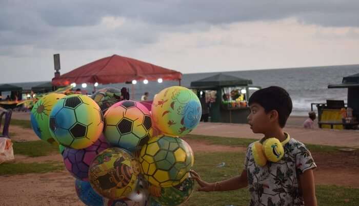 kid is enjoying with balloon