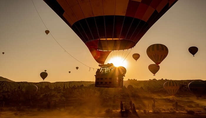 Witness The Sunrise From A Hot Air Balloon
