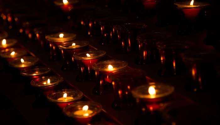 lighting candles in the church