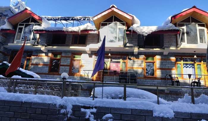 view of the snow covered house