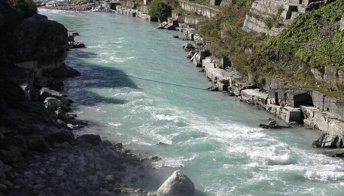 River Flowing Between Hills