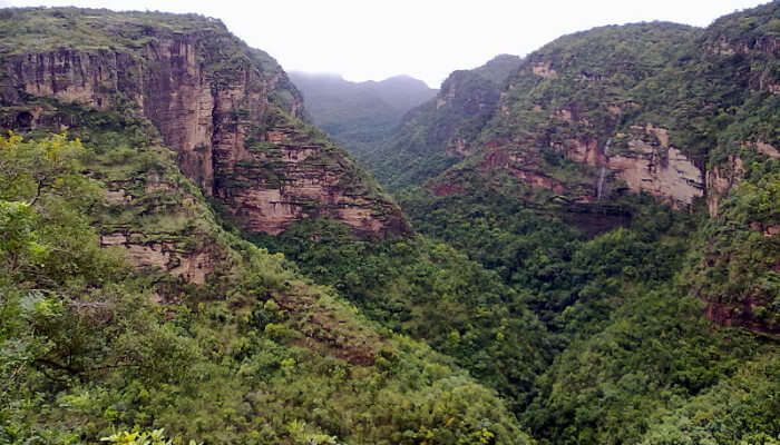 A breathtaking view of Valleys of Pachmarhi draws hikers and adventurous souls, among the best places to visit in India in summer