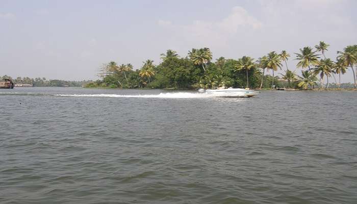 Speed boating in Vembanadu Lake, Kerala