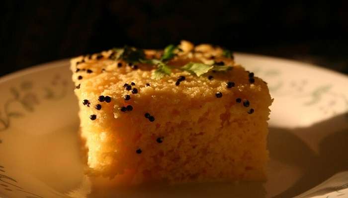 Try the yummy Khaman, one of the tasty Gujarati dishes.