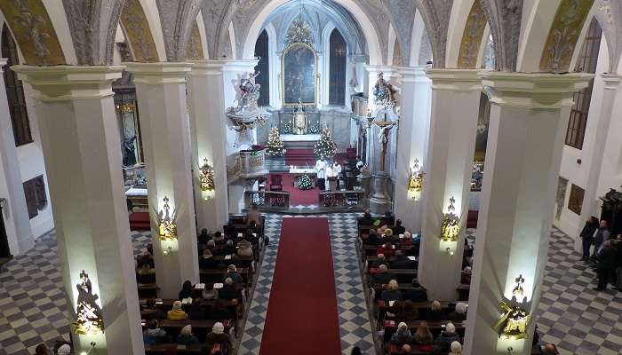 A midnight mass event on being held at a church on the Christmas Eve 