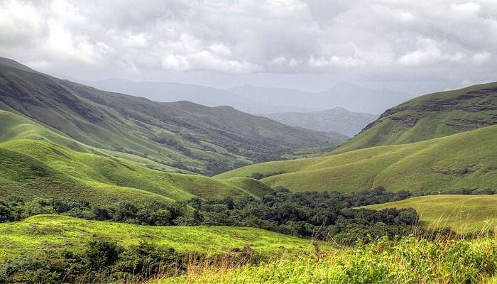 this beautiful hill range at Kudremukh is one of the best places to visit in Karnataka.