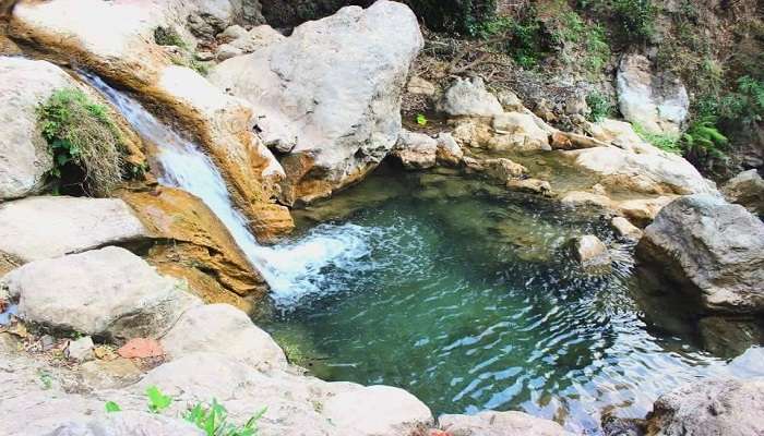 Explore the beauty of this serene waterfall