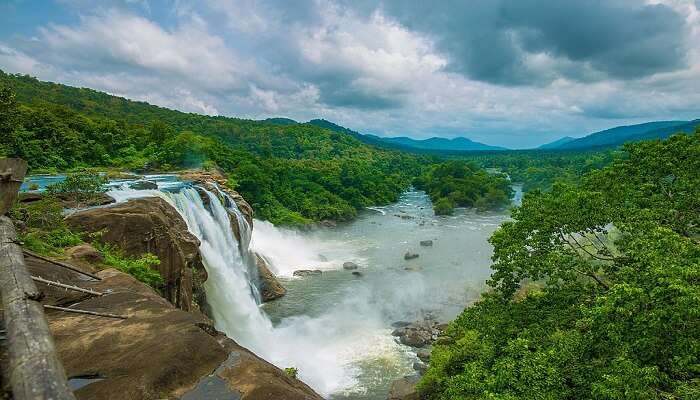 Athirappilly Waterfalls in Kerala is a top spot for honeymoon packages in Kerala.