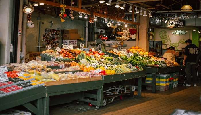 Vegetables and fruits on display in a stall