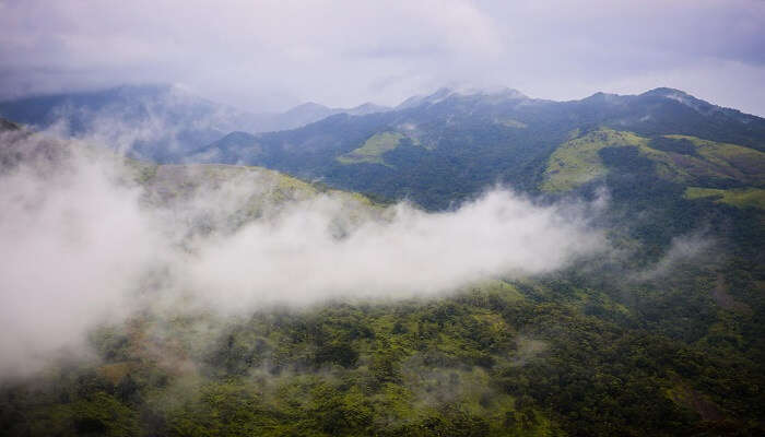 Munnar landscape, cloudy hills, the best season for adventure sports