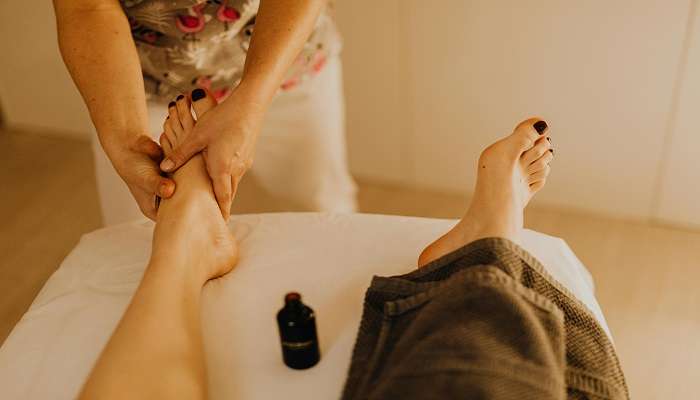 Woman getting a massage in one of the spas in Kerala.