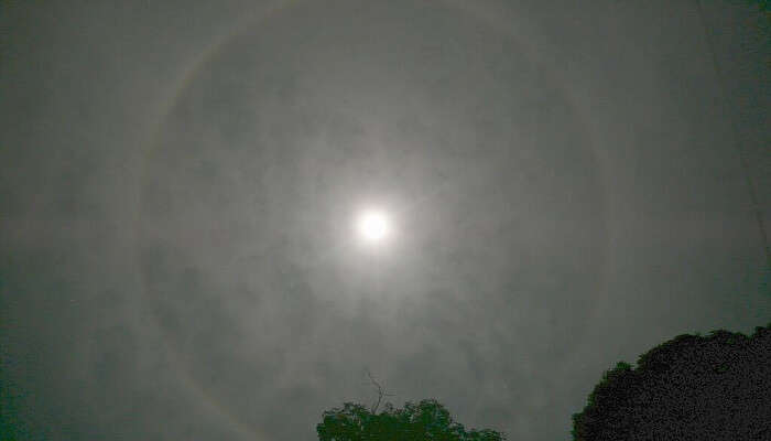 Kerala in November—clear nights with a lunar halo amid refreshing November weather.