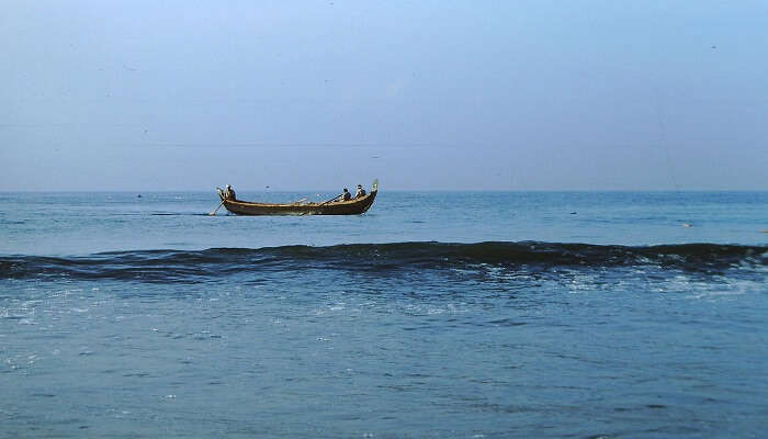 Kovalam beach resorts in Kerala with fishing boats