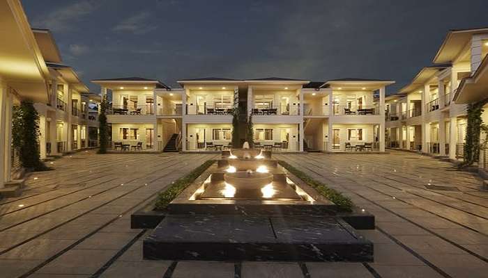 Outdoor swimming pool of The Acacia Hotel and Spa at the best hotel for honeymoon in Goa.