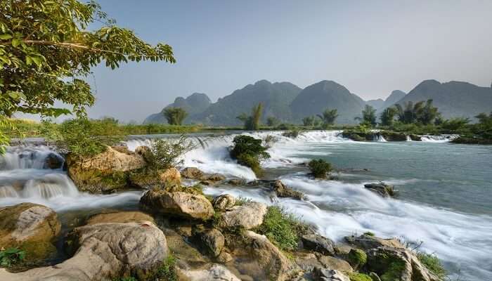 A river landscape featuring peaceful eco-tourist spots.