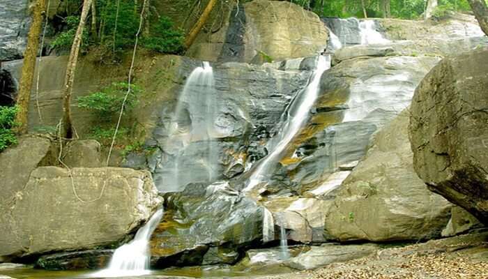 Sit back and relax at the flowing water of Vazhvanthol.