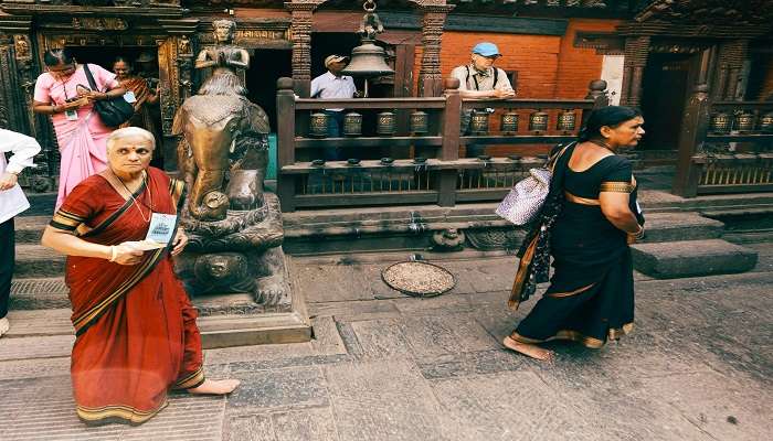 Visitors outside the beautiful temple.