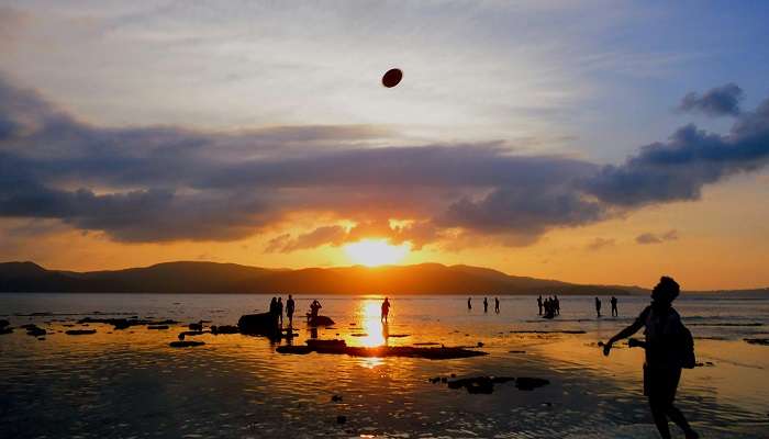 People on Water during Golden Hour