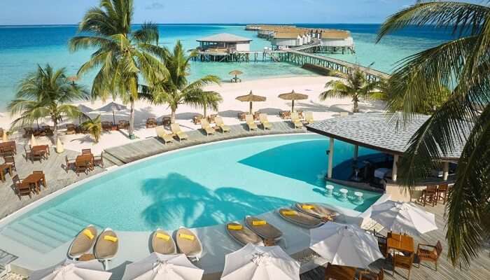 Poolside and beach side of Centara Ras Fushi Resort & Spa