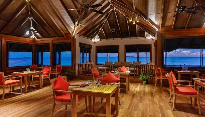 Dining area at Dhigufaru Island Resort with breathtaking scenery