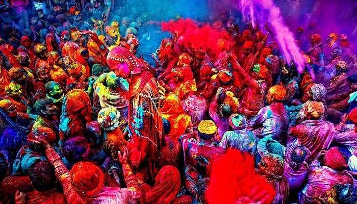 People playing with colours during Holi In Pushkar