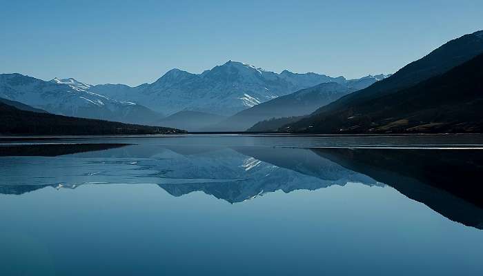 lake between mountains