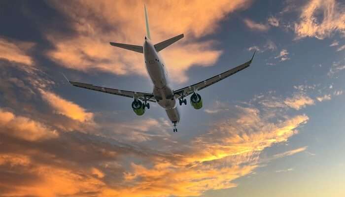 A scenic view of an aeroplane in the sky