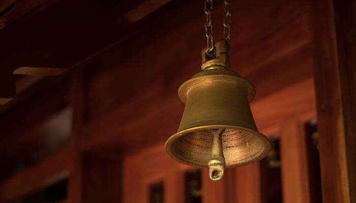 A picture of a temple bell in Maa Tara Tarini Hill Temple, one of the religious places to visit in Gopalpur