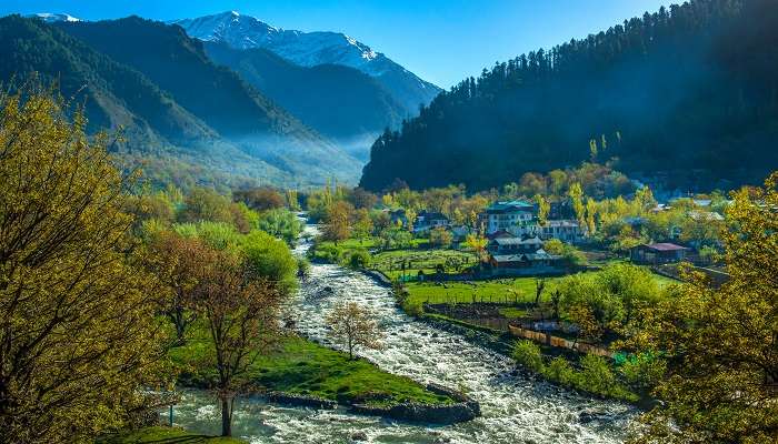 Have a pony ride in Pahalgam, a popular place to visit in Kashmir in July.