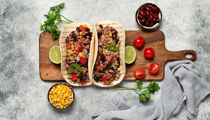 Mexican Beef Taco on a wooden board at one of the authentic Mexican restaurants in Abu Dhabi.