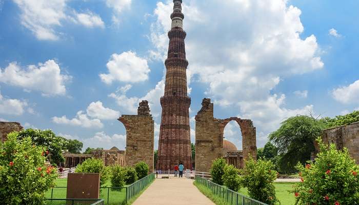 The scenic vista of Qutub Minar Complex in Delhi.