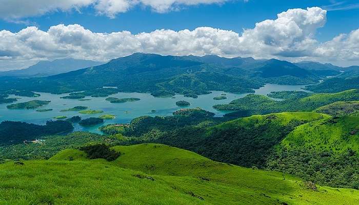 Enjoy trekking at Banasura Hill, a beautiful spot near Manikavu Temple.