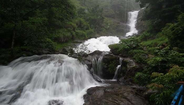 A serene photo of the Iruppu Falls,places to visit in July in India