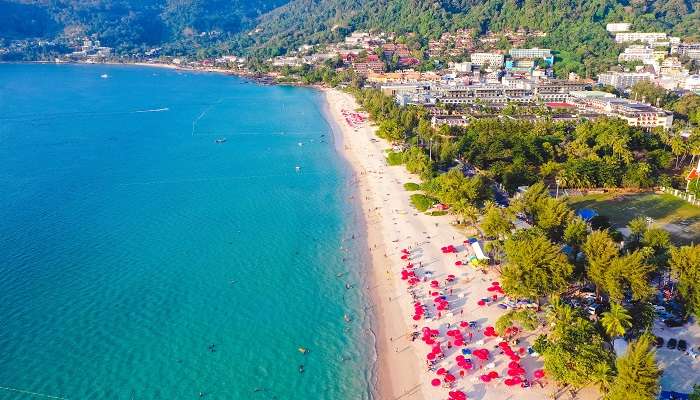 Aerial view of Patong Beach with its vibrant coastline and clear waters.