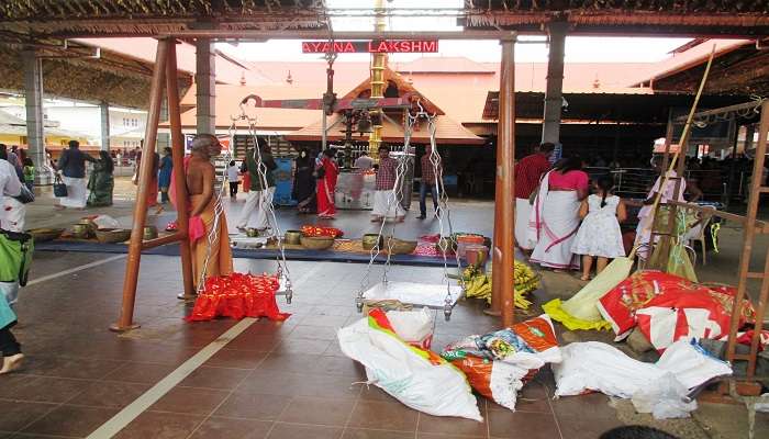 People worshipping inside the temple