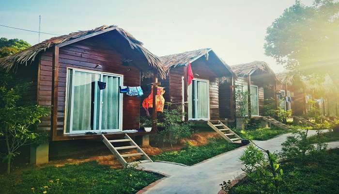 A picture of a homestay with a swimming pool
