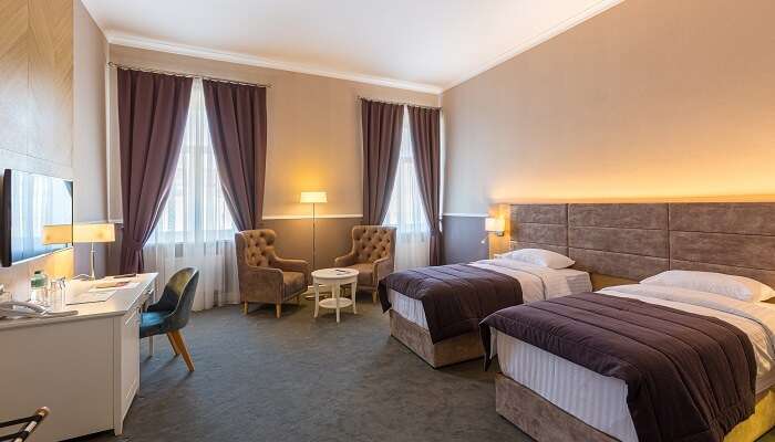 a twin room having multiple facilities.