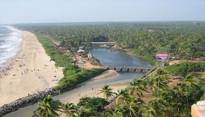 Watch the sunset at Payyambalam Beach near the Arrkkal Museum Kannur