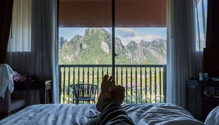 Enjoy picturesque view from balcony of Tea Castle Resort Munnar.