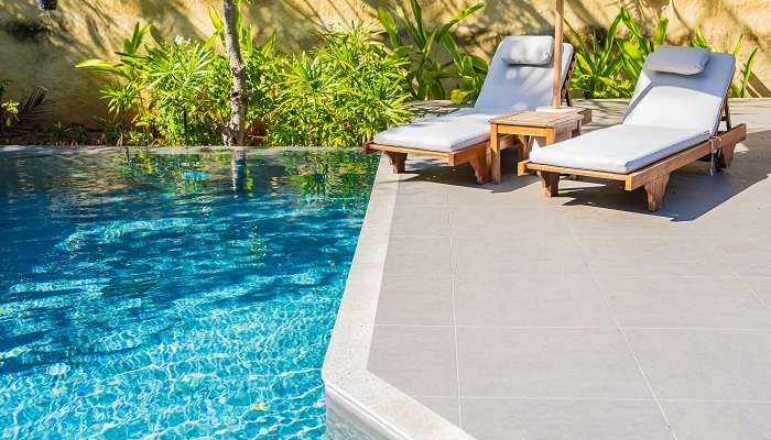 An outdoor swimming pool in a resort
